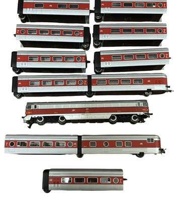 Lot 74 - A Talgo 00 gauge engine and 2-part coaches