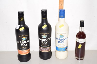 Lot 153 - Three bottles of Mirgot Bay Caribbean Liqueur...