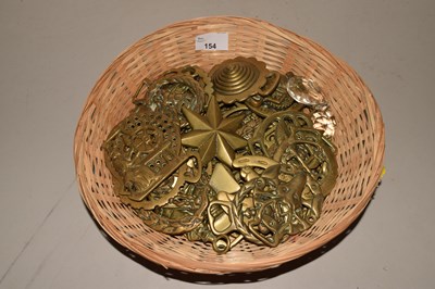 Lot 154 - A basket of assorted horse brasses