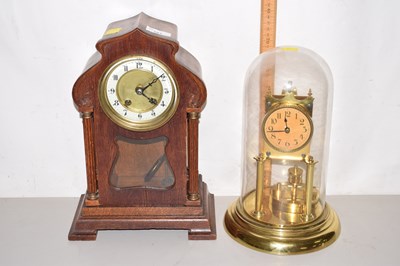 Lot 161 - An early 20th Century oak cased mantel clock,...