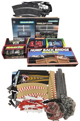 Lot 523 - Two boxes of Scalextric accessories, to...