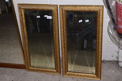 Lot 270 - A pair of gilt framed rectangular bevelled...
