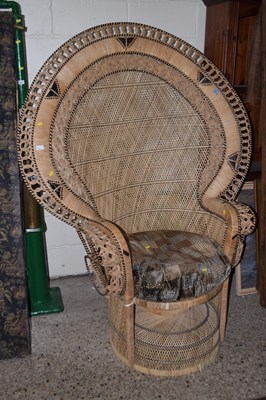 Lot 271 - A large vintage rattan peacock style armchair