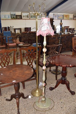 Lot 338 - An onyx standard lamp and a coat rack