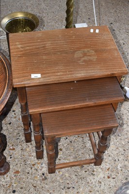 Lot 344 - A nest of three hardwood tables