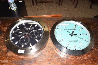 Lot 353 - Two Rolex style wall clocks marked Oyster...