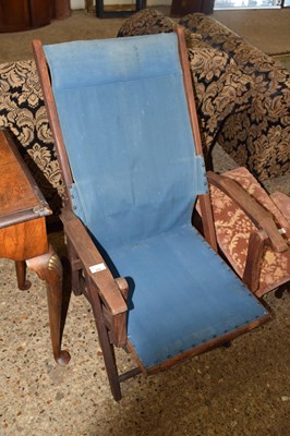 Lot 375 - A folding hardwood framed deckchair