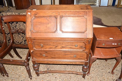 Lot 378 - A 20th Century oak bureau