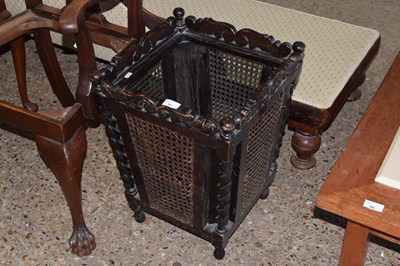 Lot 381 - An oak framed and rattan stick stand or bin
