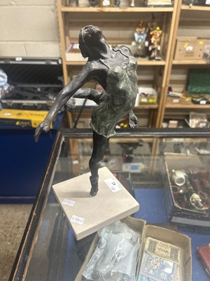 Lot 42 - A bronzed composition model of a ballerina