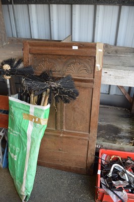 Lot 407 - An antique oak panel with carved decoration