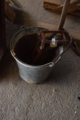 Lot 433 - A galvanised bucket and a foot pump