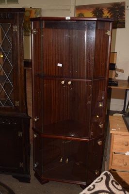 Lot 779 - Glazed darkwood finish corner display cabinet