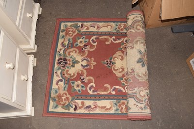 Lot 778 - A pink ground rug