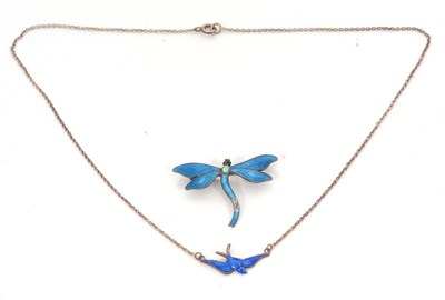 Lot 257 - A silver and blue enamel swift pendant...