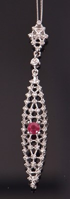 Lot 87 - A 9ct ruby and diamond pendant necklace, the...