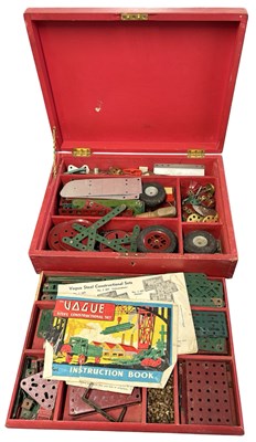 Lot 405 - A vintage collection of Meccano in two-tiered...