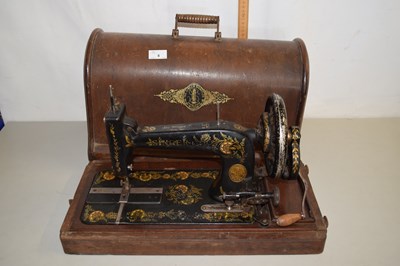 Lot 8 - A Singer sewing machine with box