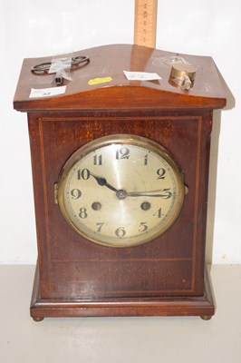 Lot 32 - An Edwardian mantel clock in mahogany case