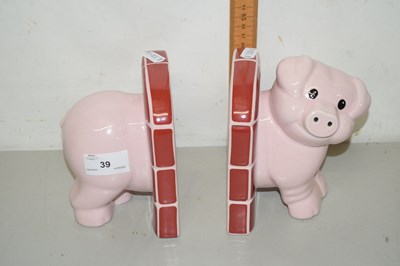 Lot 39 - Pair of book ends modelled as a pink pig