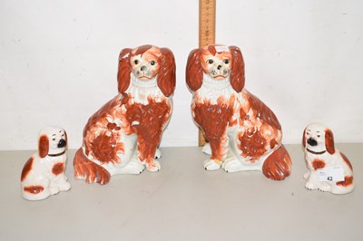 Lot 42 - A pair of Staffordshire dogs with sponged iron...