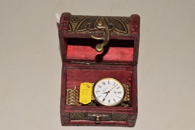 Lot 101 - Box containing a gents wristwatch