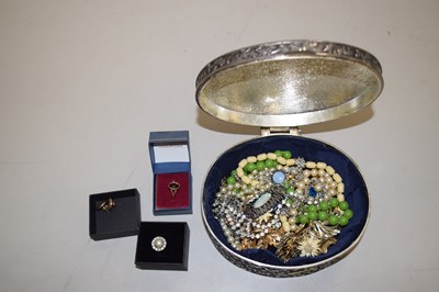 Lot 106 - Round metal box with foliate design containing...