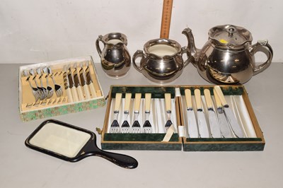 Lot 158 - A ceramic silver coloured teapot, milk jug and...