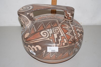 Lot 523 - A Mediterranean style terracotta bowl and handle