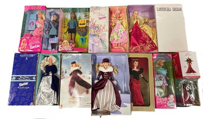 Lot 497 - A group of boxed collector's Barbie dolls,...