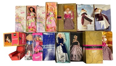 Lot 498 - A group of boxed collector's Barbie dolls,...