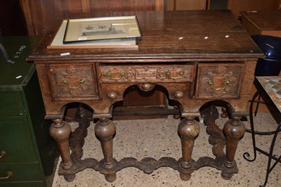 Lot 299 - A heavy carved oak hall table