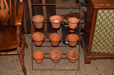 Lot 306 - Plant pot holder and pots