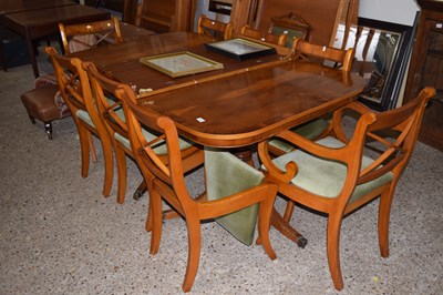 Lot 350 - A reproduction rectangular extending dining...
