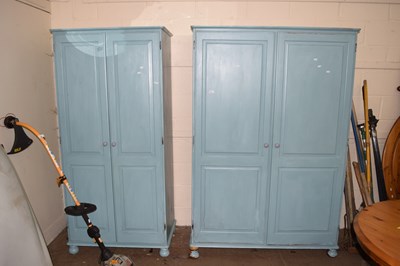 Lot 756 - Two painted pine wardrobes to include one...