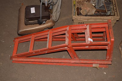 Lot 757 - Two red metal car ramps