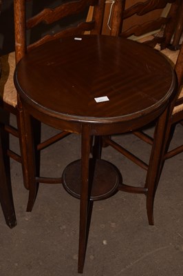 Lot 775 - A circular oak hall table