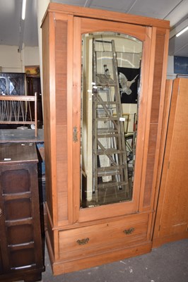 Lot 841 - A pine mirror fronted wardrobe