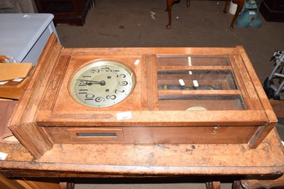 Lot 847 - A wall mounted clock (a/f)