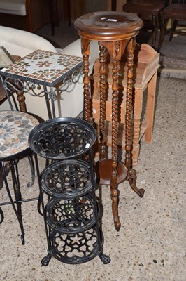 Lot 293 - A wooden torchere stand and a four tier metal...