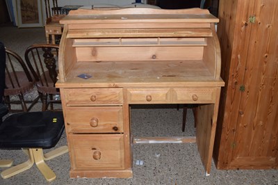 Lot 315 - A pine roll top desk