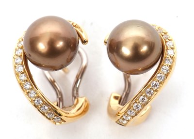 Lot 131 - A pair of 'chocolate' pearl and diamond...