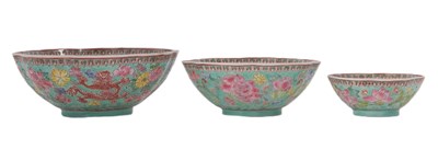 Lot 202 - A graduated set of three bowls all eggshell...