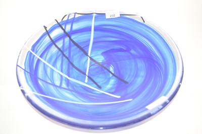 Lot 232 - A large Kosta Boda charger with blue and white...