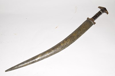 Lot 125 - North African / Middle Eastern short sword...