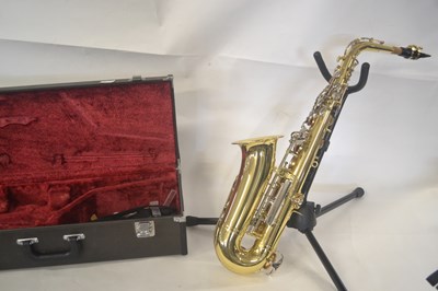 Lot 271 - A Yamaha saxophone, gold coloured in...