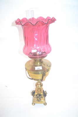 Lot 280 - A late 19th Century brass oil lamp with...
