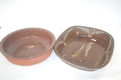 Lot 285 - A large slip ware decorated dish together with...