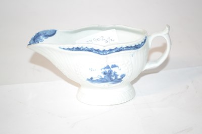 Lot 297 - A small Worcester porcelain sauce boat, the...
