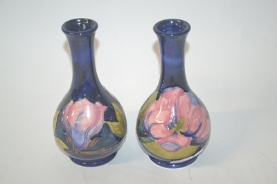 Lot 309 - Small pair of Moorcroft baluster vases, the...